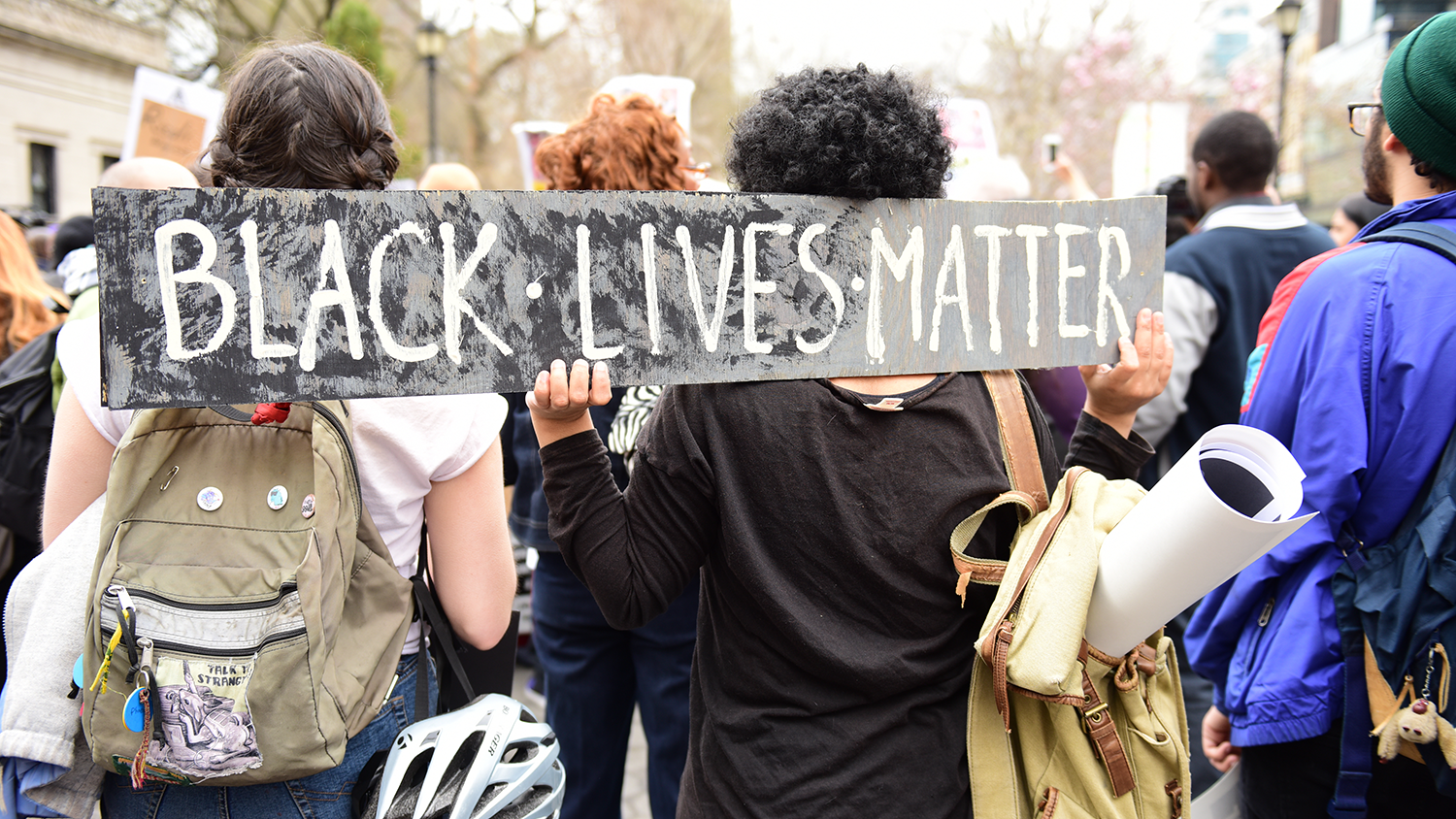 Students with Black Lives Matter sign