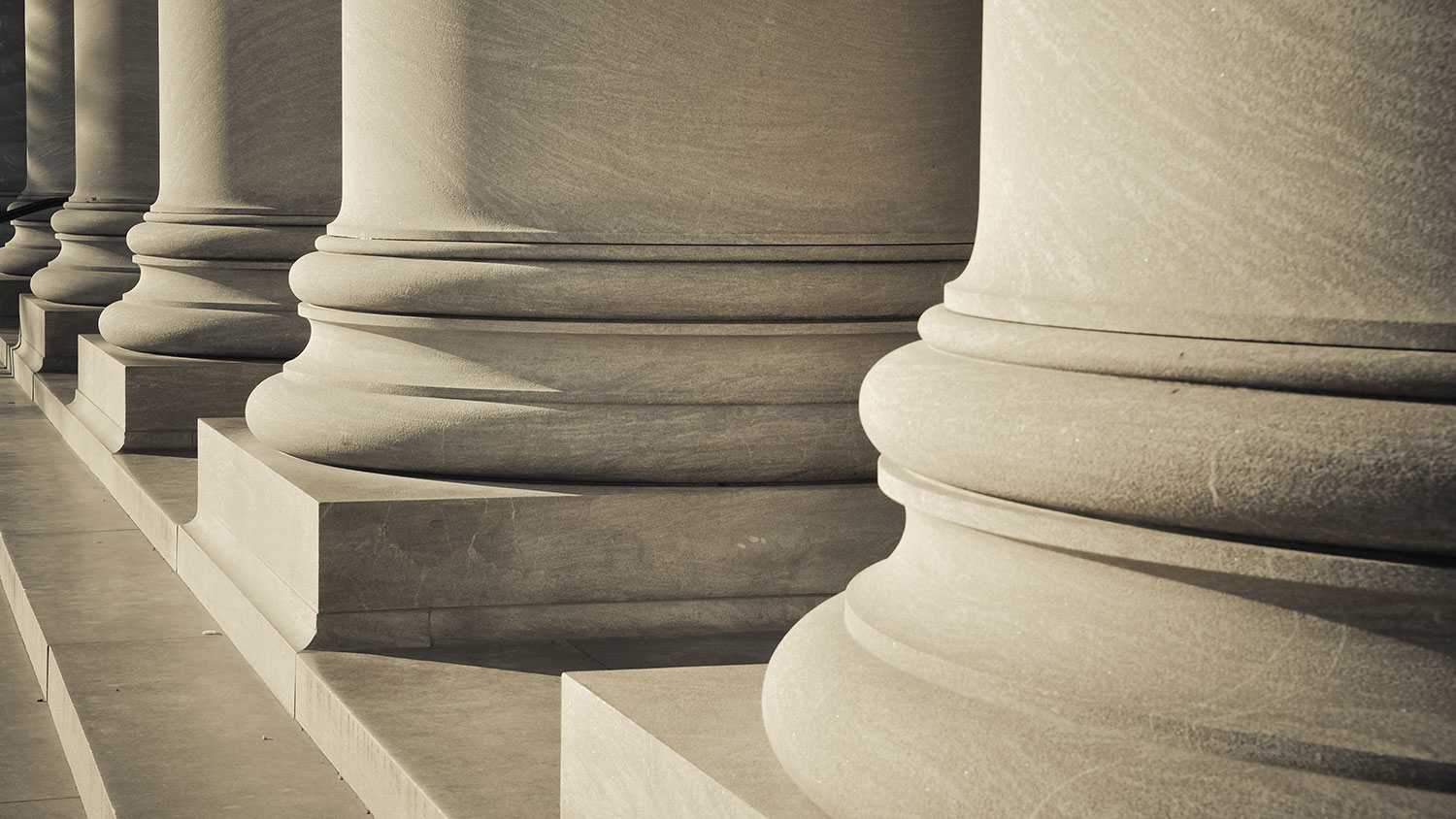 A row of stone columns on a building