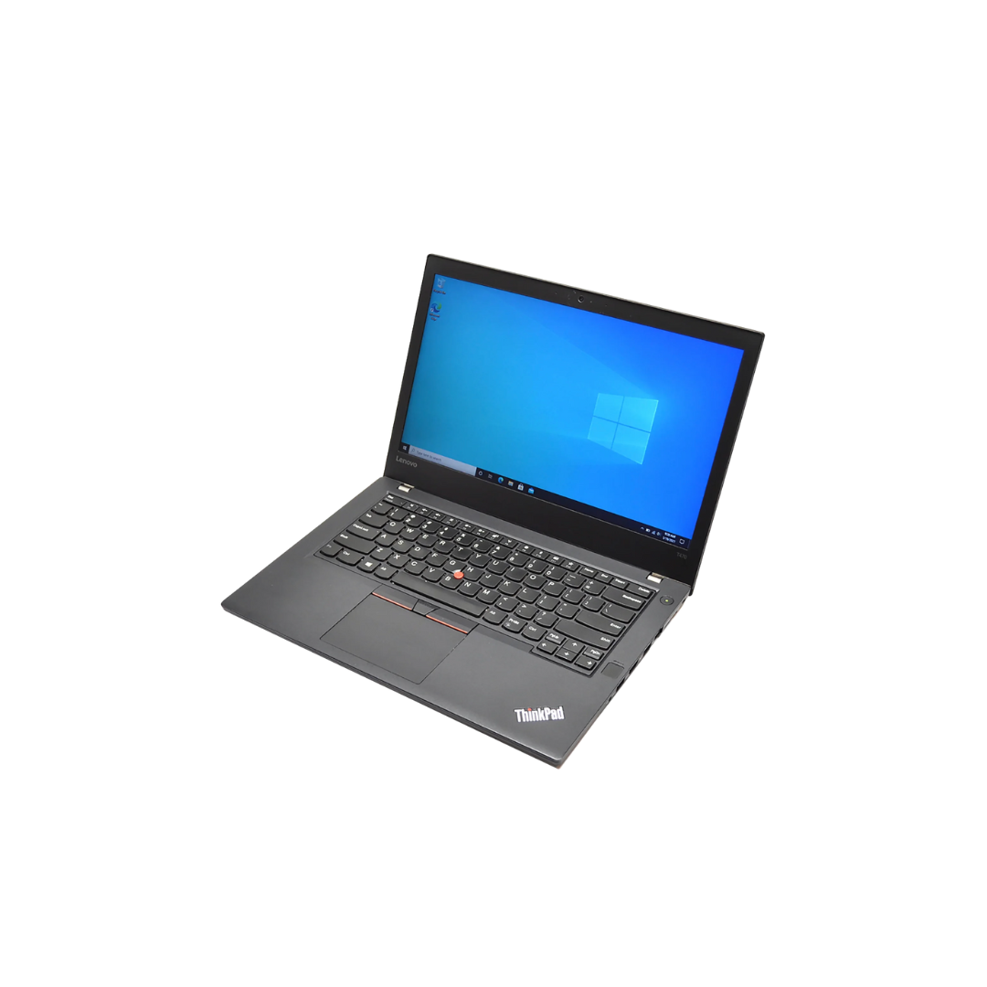 A black Lenovo ThinkPad laptop is open with a Windows 10 desktop screen displayed. The laptop features a red TrackPoint in the center of the keyboard.